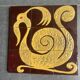 Ceramic plaque with zoomorphic pattern made up of 9 tiles.