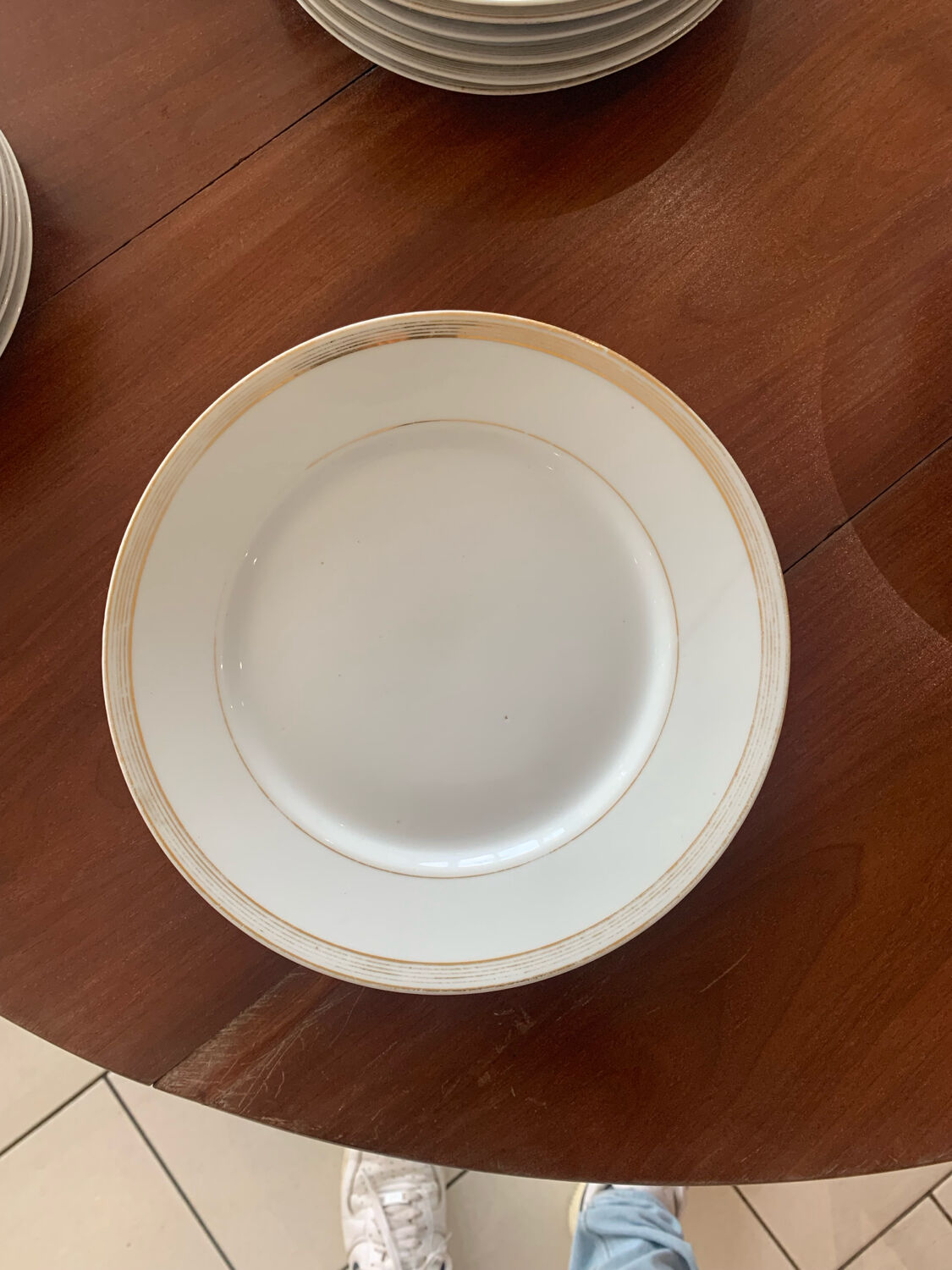 Lot of six flat plates, crockery, old white, gilded