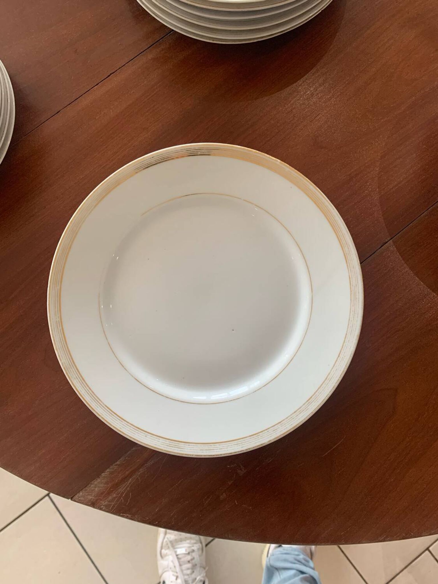 Lot of six flat plates, crockery, old white, gilded