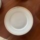 Lot of six flat plates, crockery, old white, gilded