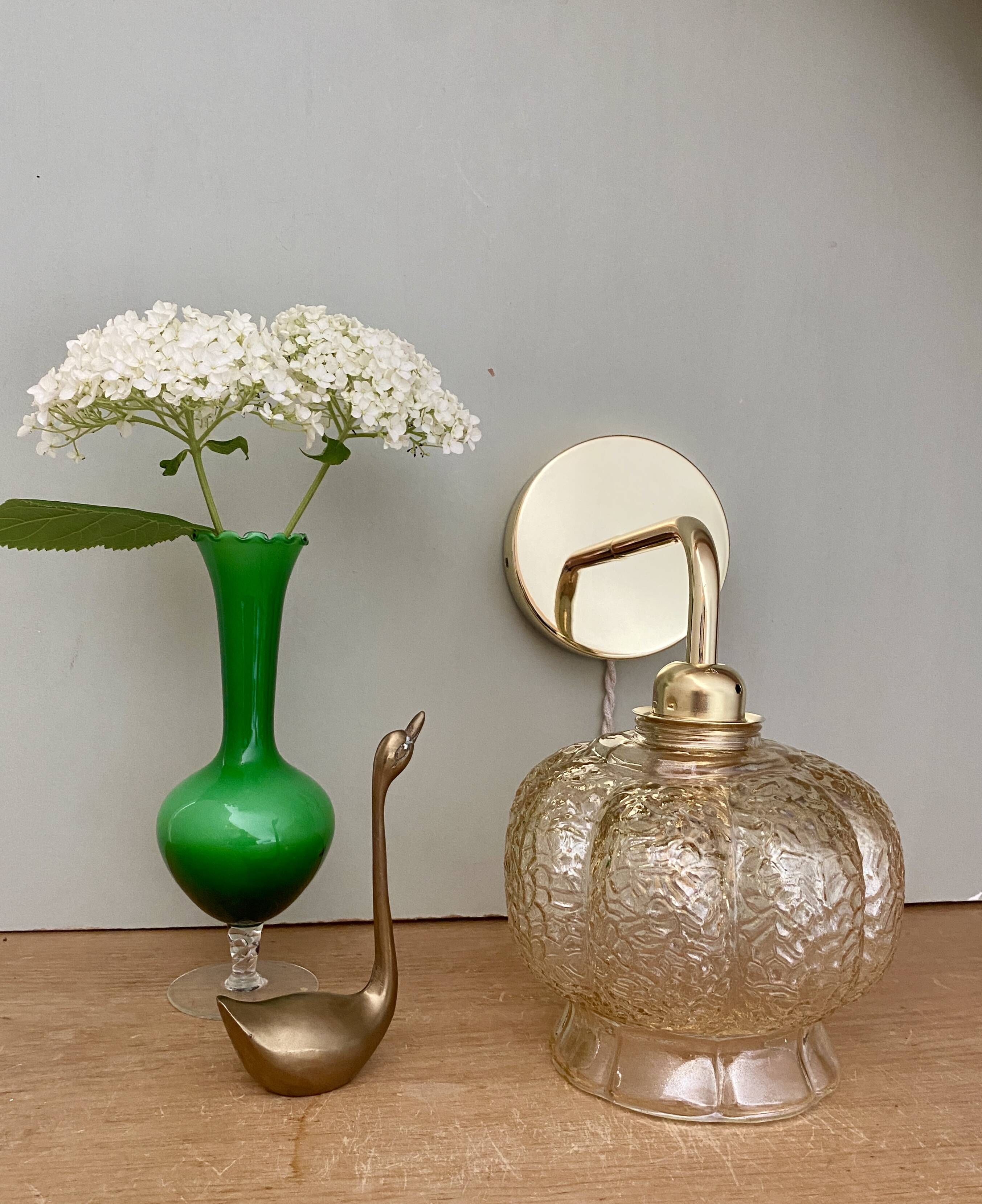 Vintage golden globe angled wall light in amber glass