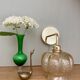 Vintage golden globe angled wall light in amber glass