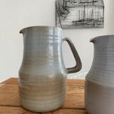 Pair vintage enamelled ceramic pitchers