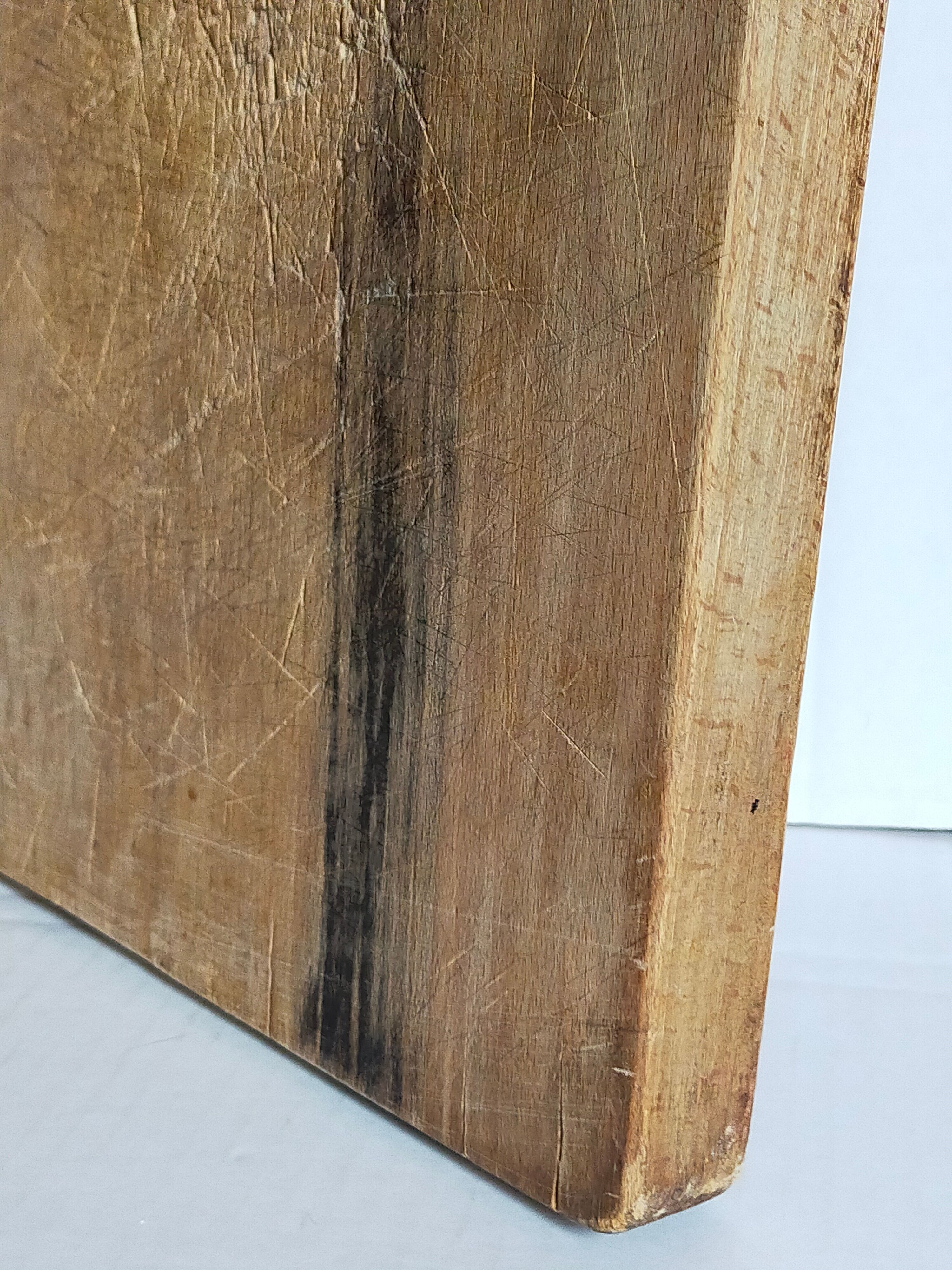 Cutting board in old solid wood