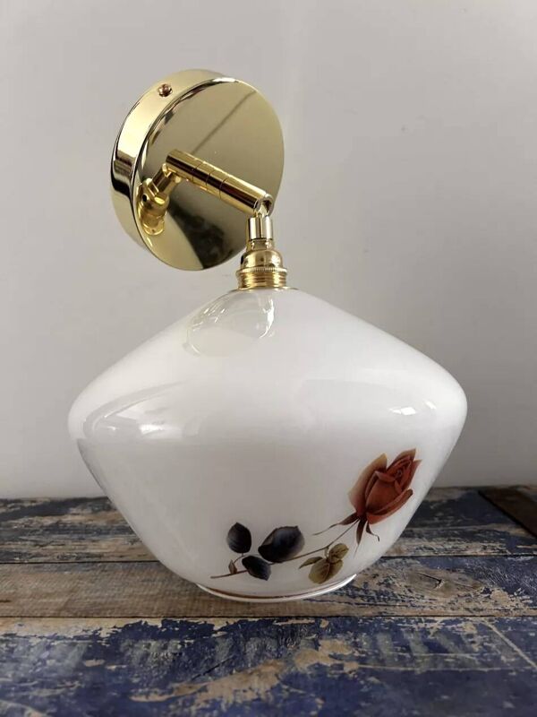Applique murale dorée inclinable globe fleuri