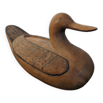Wooden duck with compartment