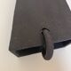 Pair of black stoneware graphic wall lights with handmade ring.