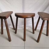 Trio of vintage brutalist tripod stools
