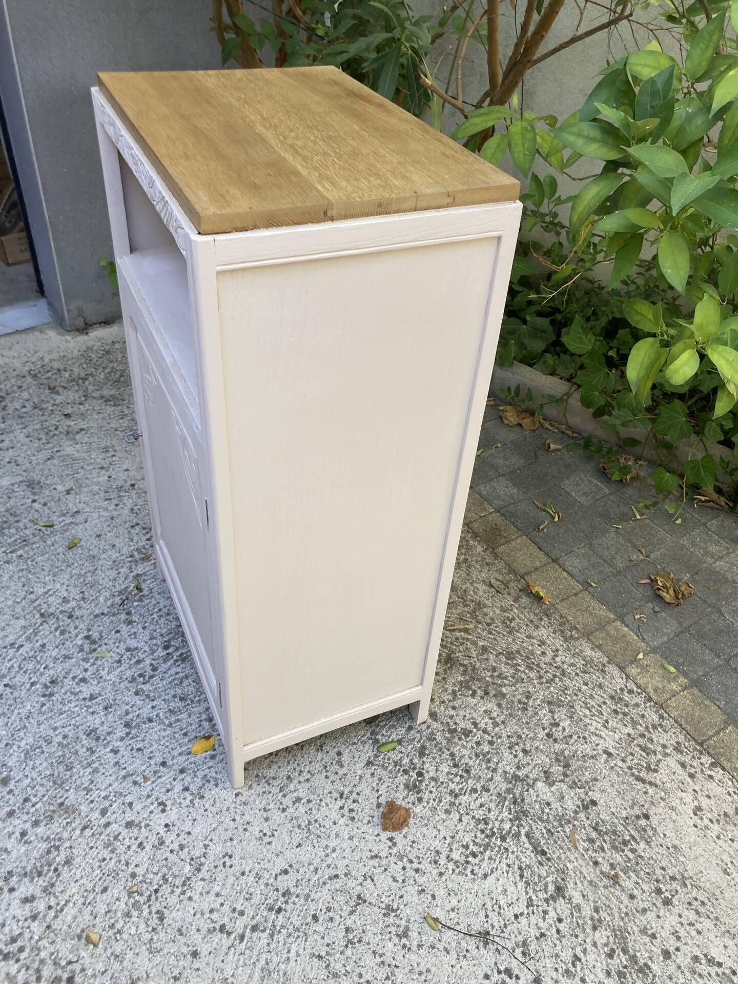 Beautiful art deco jam cupboard in delicate beige tone / and wicker basket