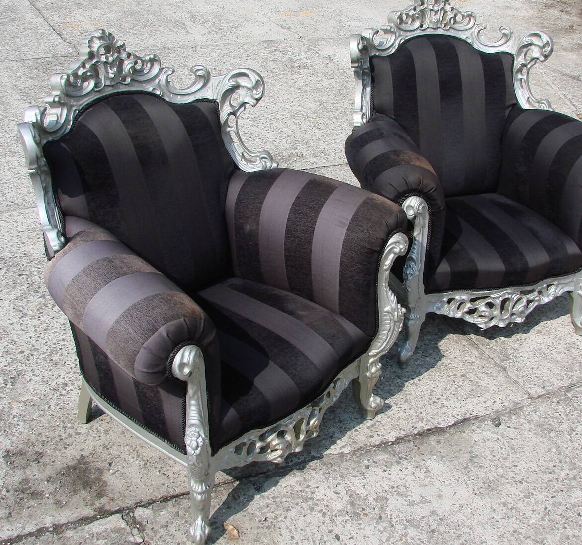 A pair of vintage armchairs, 1980s, lacquered wood and fabric