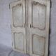 Pair of Louis XV period walnut and ash cabinet doors