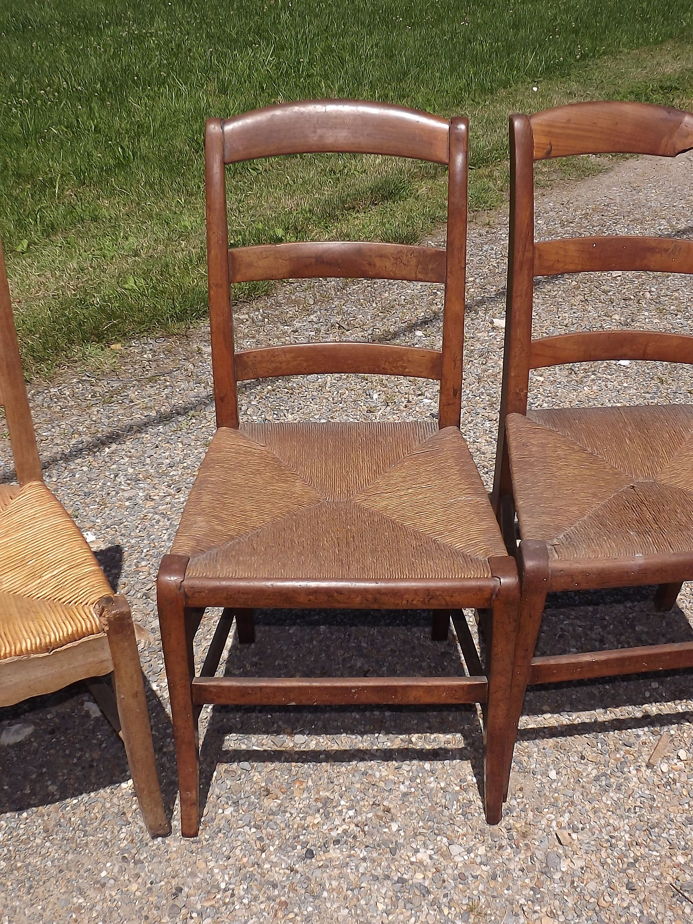 17 old straw chairs
