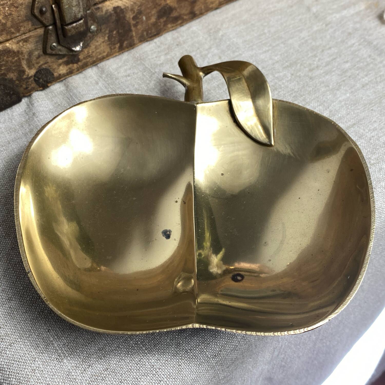 Large brass apple pocket emptier