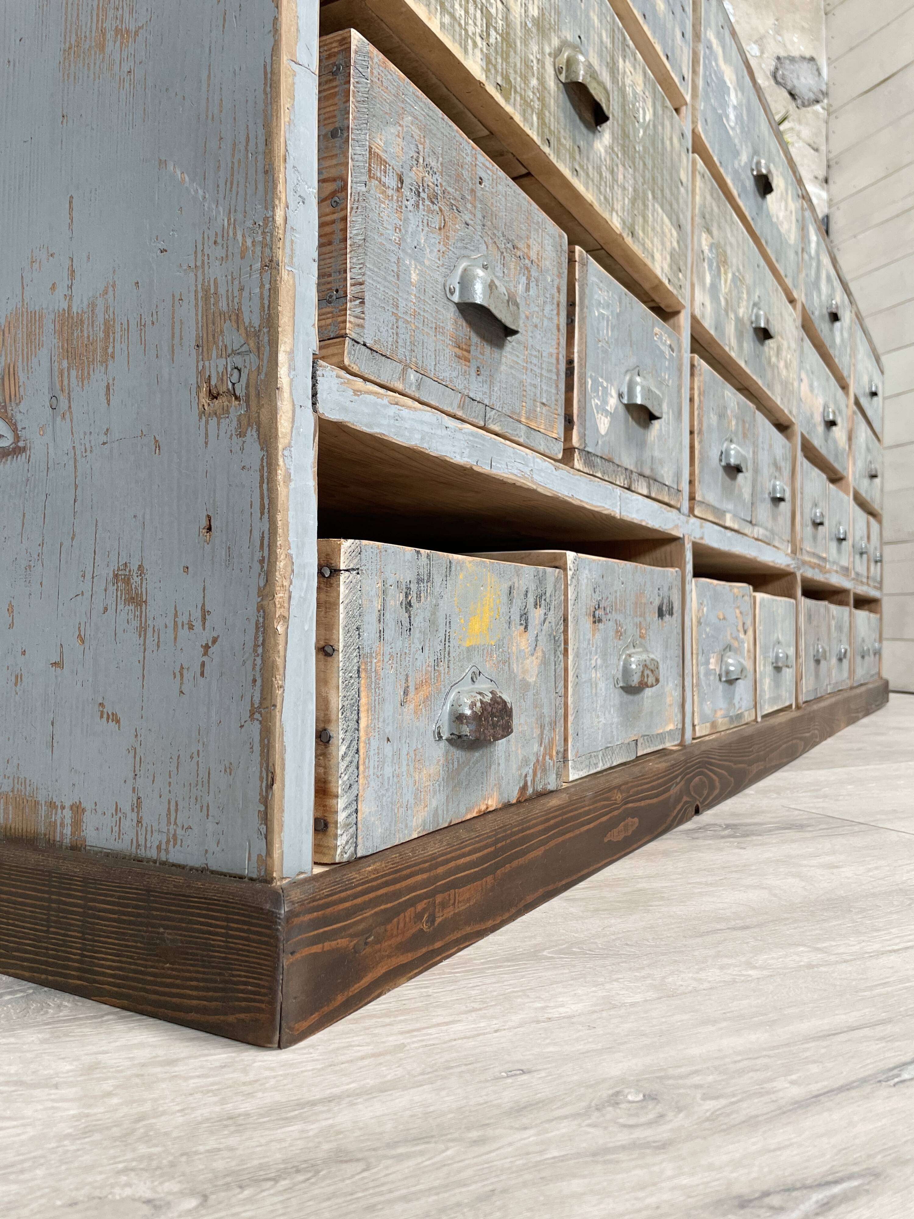 Artisanal workshop bank in patinated wood, circa 1950.