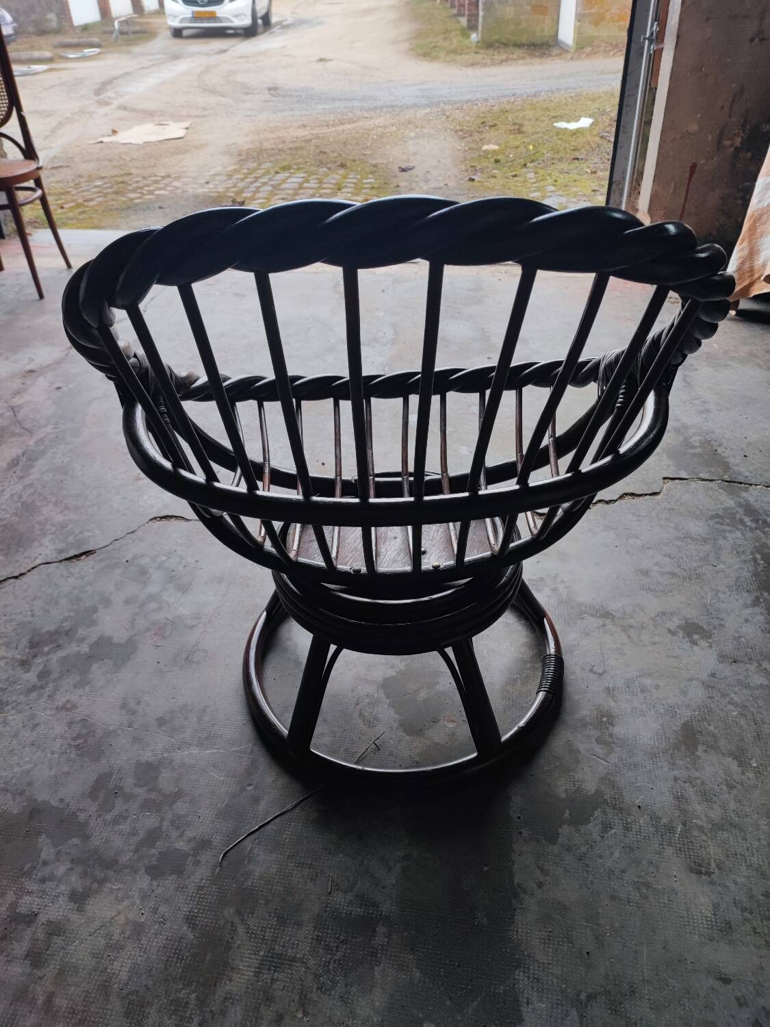 Swivel rattan love seat