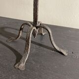 Pair of beaten iron candlesticks