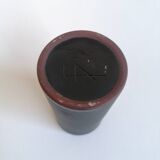 Matte black scroll vase by Antonio Lampecco