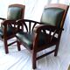 Paire de fauteuils style colonial bois et cuir de chèvre