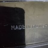 Complete set of miniature dominoes in black and white box.