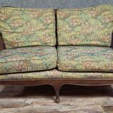 Antique English two-seater canapé, carved wooden frame.