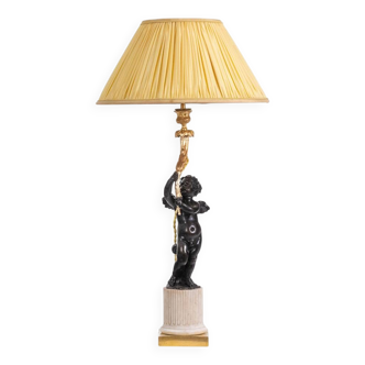 Lampe en bronze représentant un putti, socle en marbre. Circa 1880.
