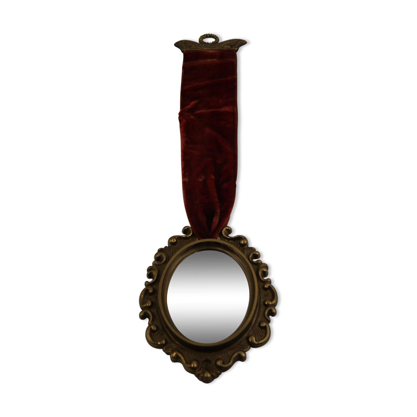 Vintage oval wall-mounted brass mirror