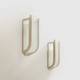Pair of modernist wall sconces in nickel-plated steel and opaline glass, 1930.