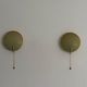 Pair of green plexiglass and gold metal wall lights by Erco, 1950s, Germany.