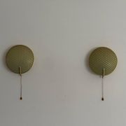 Pair of green plexiglass and gold metal wall lights by Erco, 1950s, Germany.