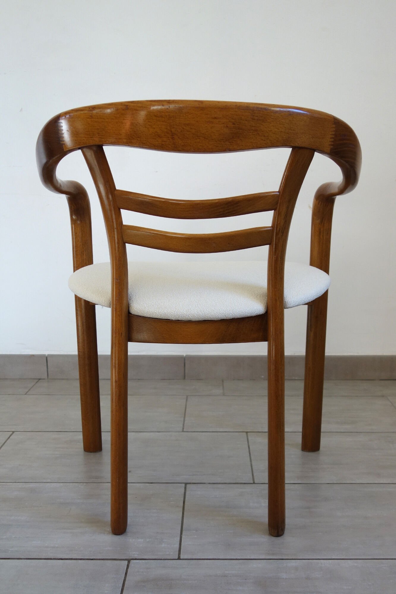 Vintage wooden armchair and thin buckle