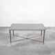 Table basse en laiton patiné et verre Maison Charles années 1960
