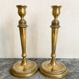 Pair of old gilded brass candlesticks