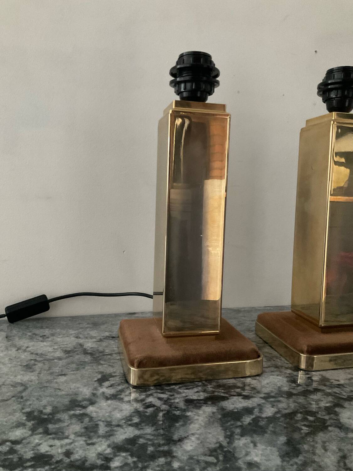 Pair of Hollywood Regency brass table lamps from the 1970s.