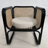 Cubic armchair in black rattan and canework