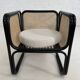 Cubic armchair in black rattan and canework