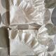 Two half-moon ruffled cushion covers