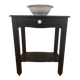 Small Art Deco console reinterpreted – matte black wood with drawer