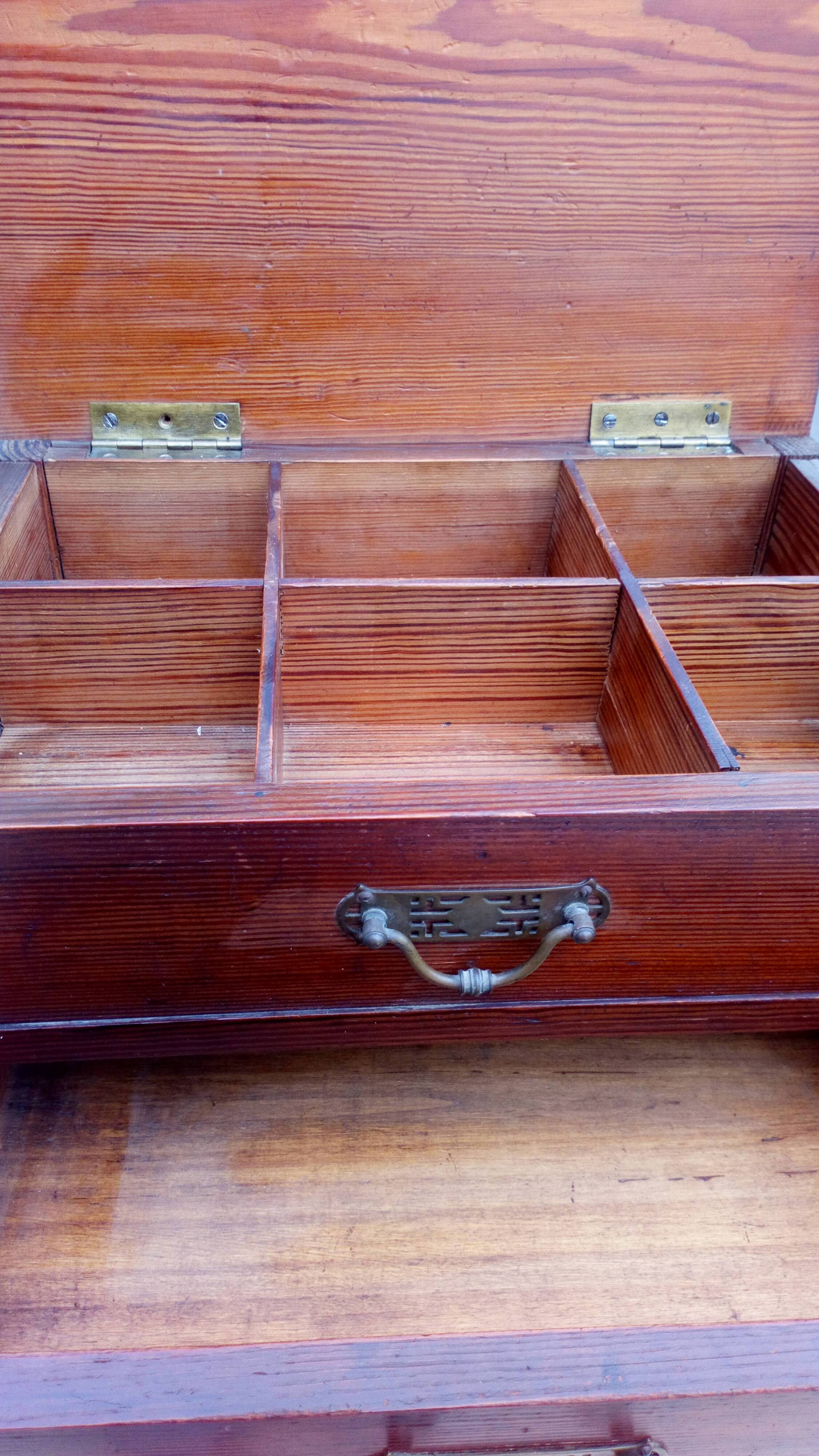 Small low cabinet for sewing from the 1930s.
