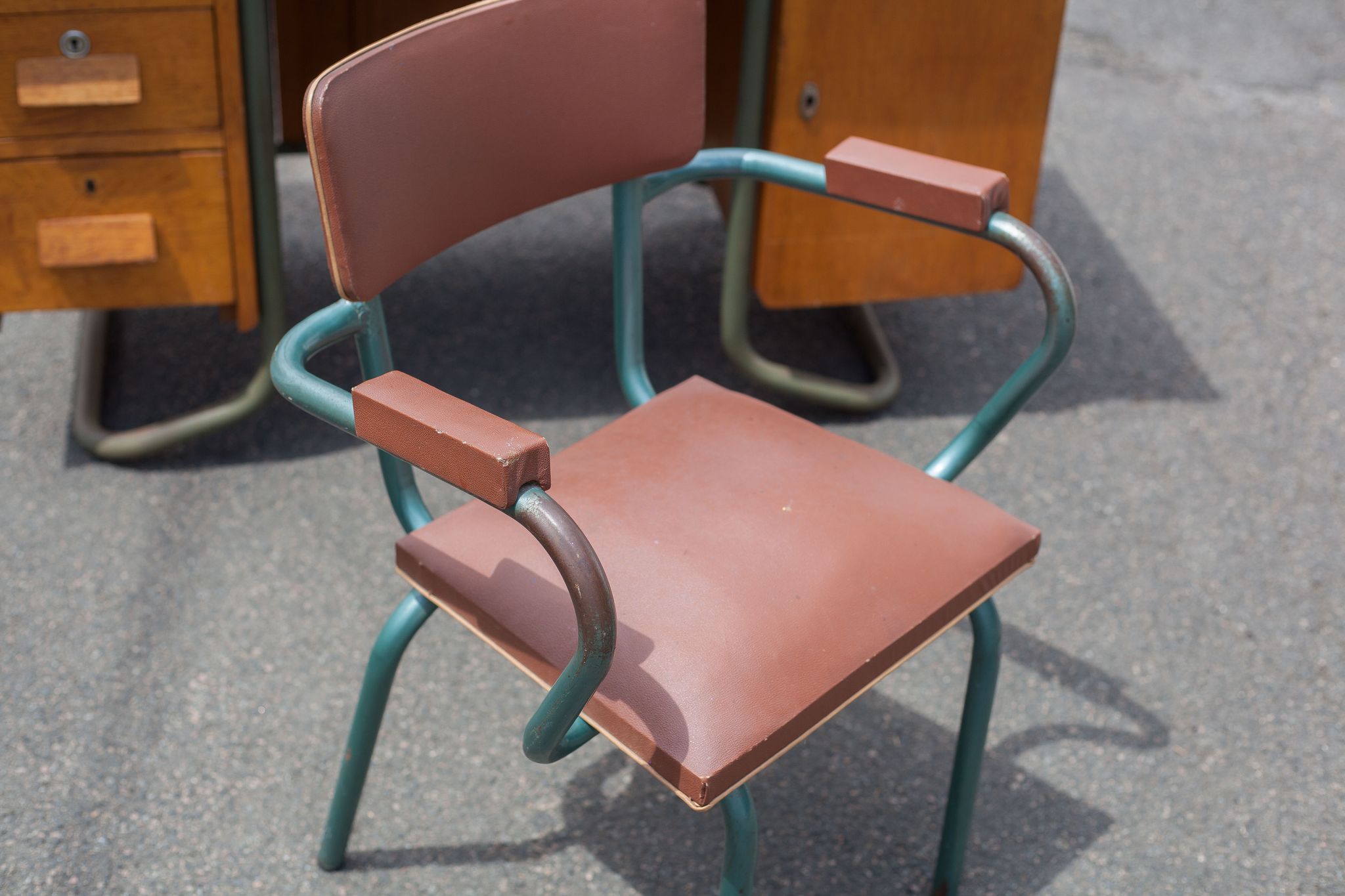 School teacher's chair in imitation leather and tubular metal