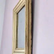 Small Art Deco mirror with a gilded wooden frame.