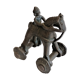 Old child's toy. Horse with bronze wheels. Ethnic object.