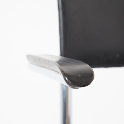 Tubax cantilever chair with black armrest