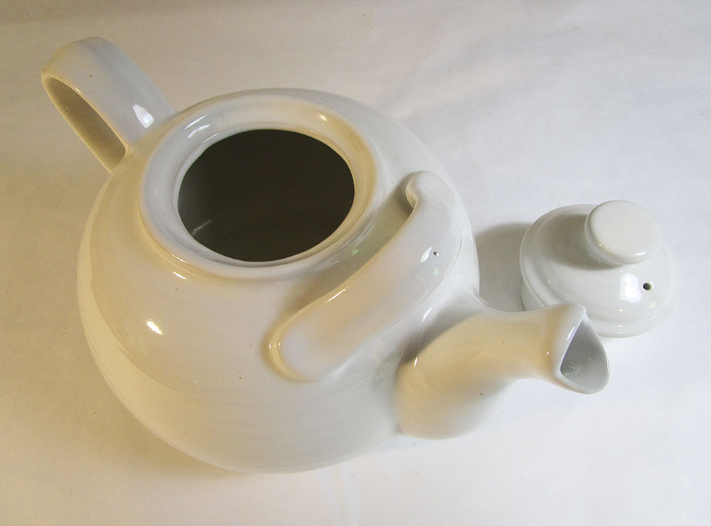 Large white ceramic teapot