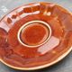 Old cups and under cups of coffee - brown ceramics typical of station buffets