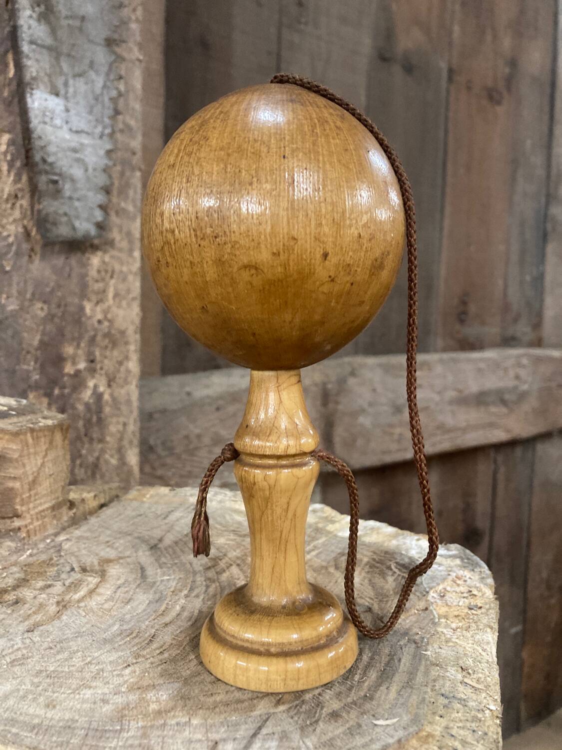 Old wooden bilboquet