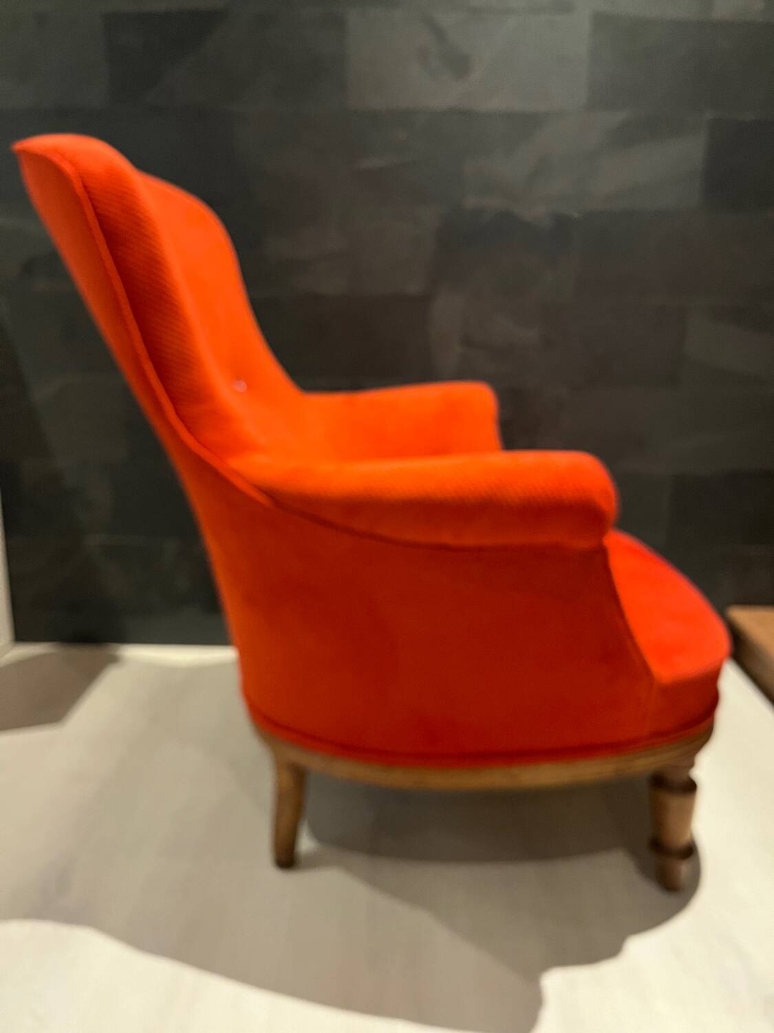 Antique reupholstered armchair