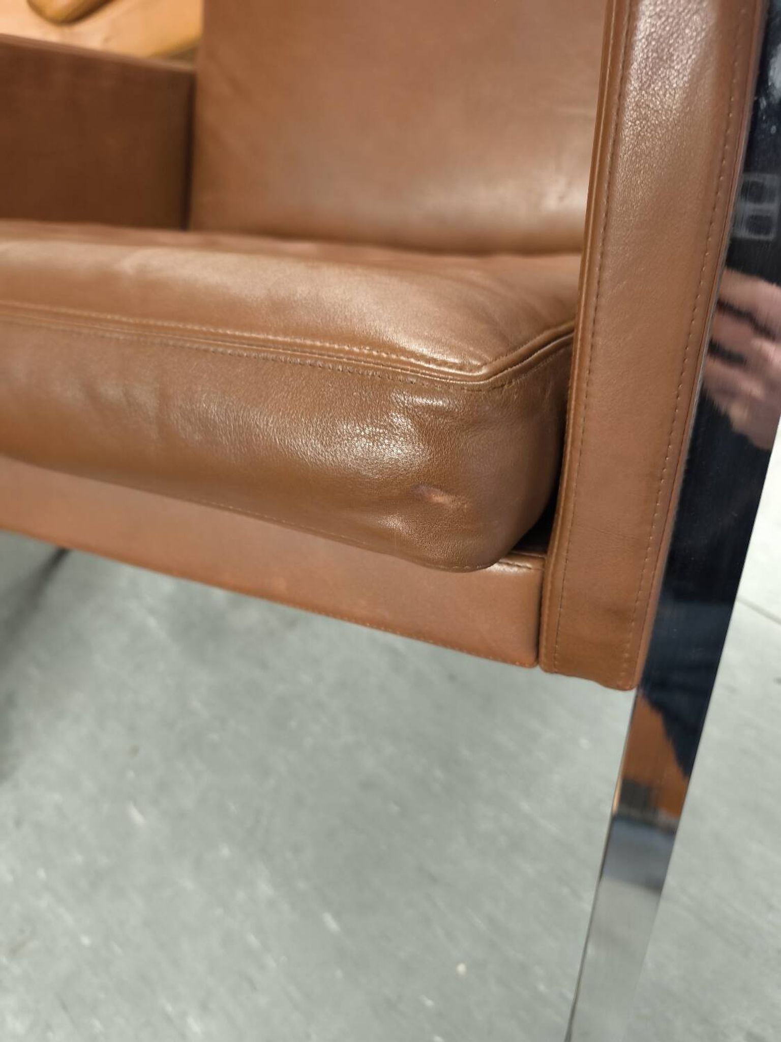 Leather armchair, 1970s, manufacturer Sitag, cognac brown leather.