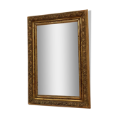 Antique mirror in gilded wood