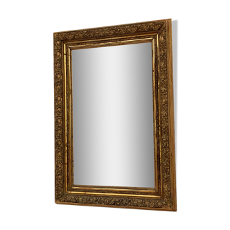 Antique mirror in gilded wood