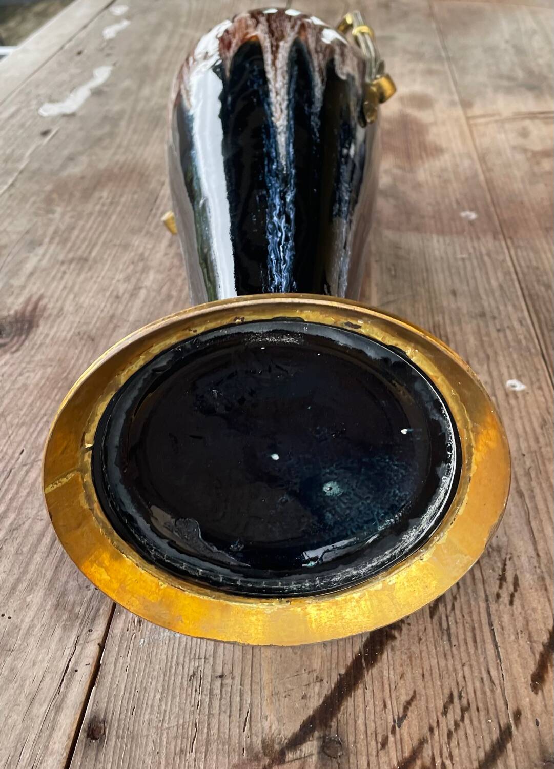 Two large stoneware vases with bronze fittings.
